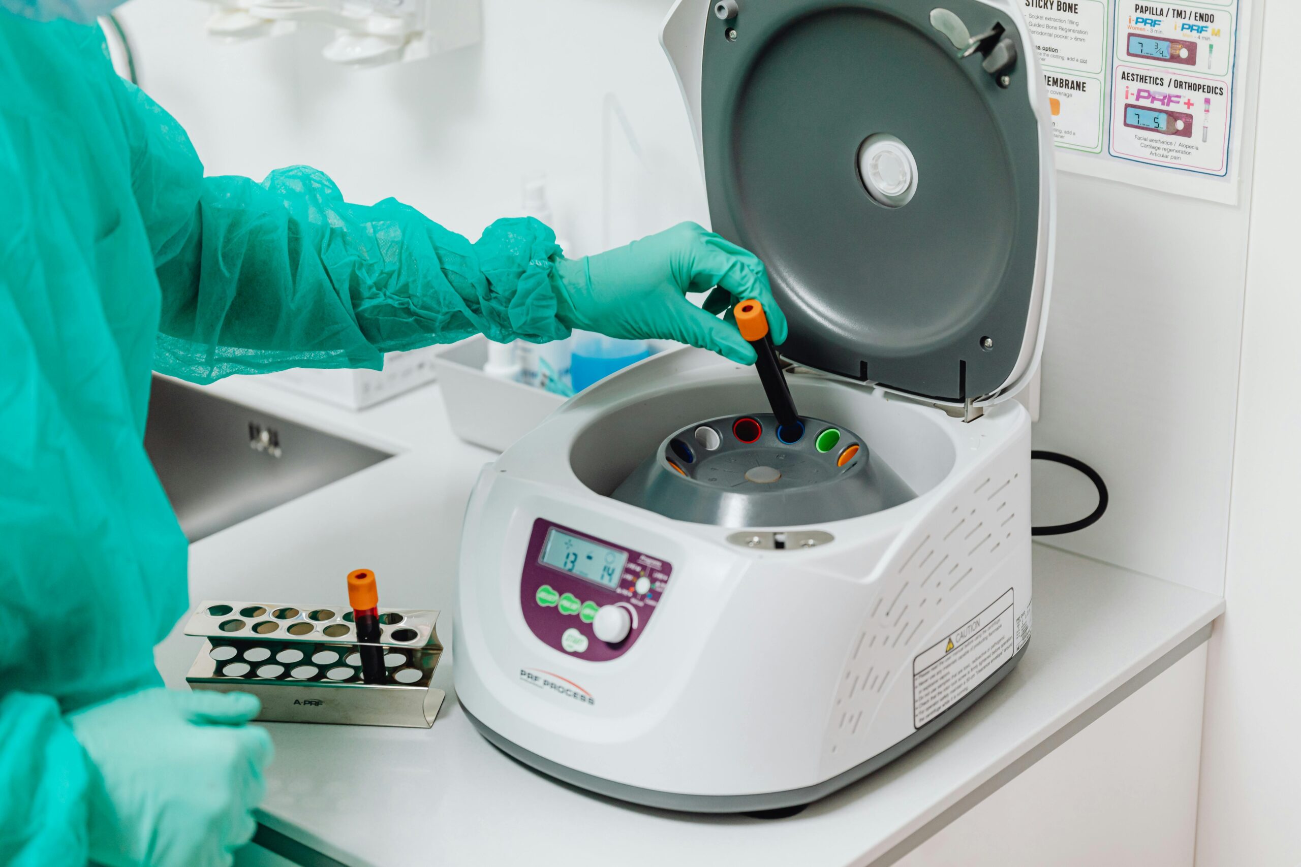 Doctor Using a Centrifuge Machine